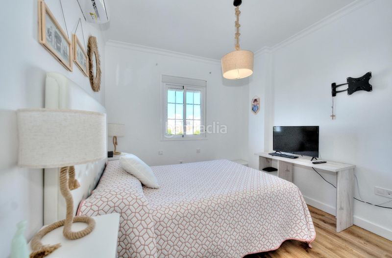 Foto ecf95f60-06ac-4e3a-a6cb-f147fbb48d65. Casa aparellada amb aparcament a Ayamonte ciudad Ayamonte