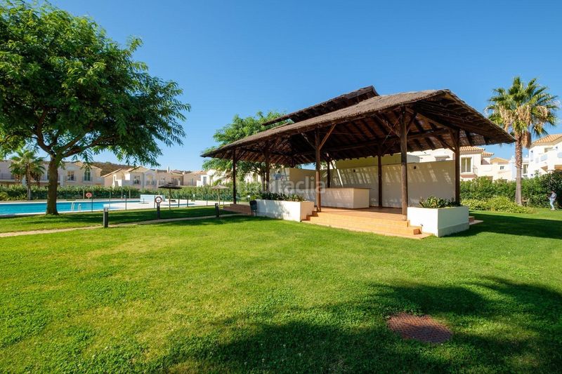 Foto 28d9d7f6-4f7c-4efe-a543-074f3ccfbc79. Chalet avec parking piscine dans Costa Esuri Ayamonte