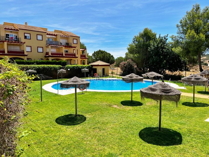 Foto 1cf5a977-8a38-45cd-8921-90c70ab29408. Apartament amb aparcament piscina a Costa Esuri Ayamonte