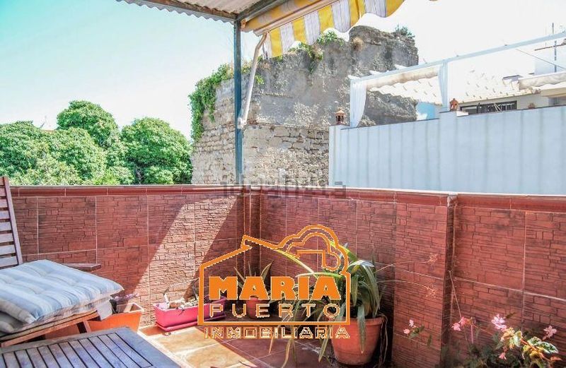 Foto c561ae68-d794-4f2f-b55d-9cf2970d2af2. Casa adosada en Casco Antiguo Marbella
