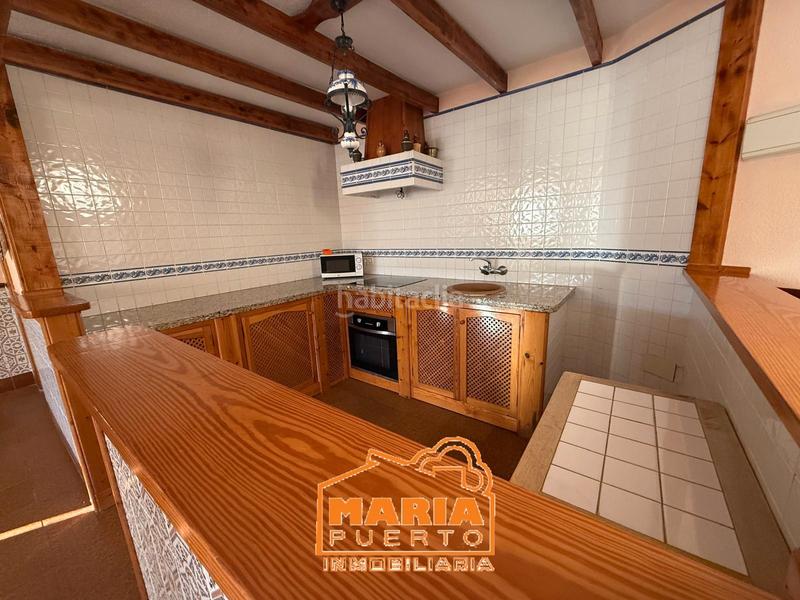 Foto 52bf8042-fac3-4601-8c85-5ae6732f4ea0. Xalet amb xemeneia aparcament piscina a Puertosol Málaga