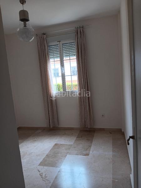 Foto 63b041ff-bdfa-4d11-af82-d83427bd1f84. Lloguer casa aparellada amb xemeneia piscina a Gelves