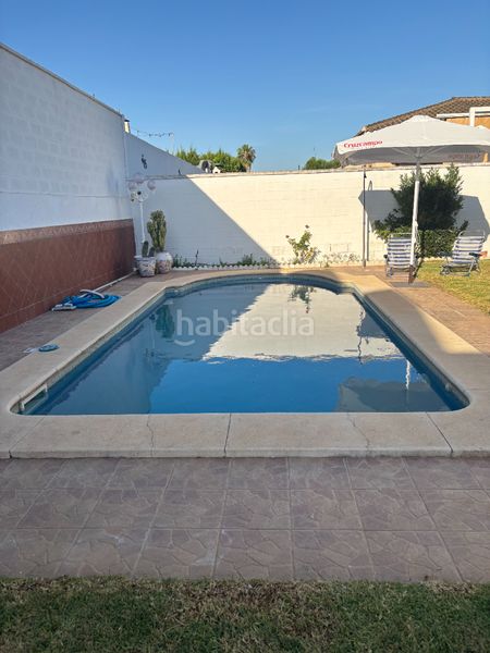 Foto eb255dff-7410-4850-93dc-ce0b7be8a5a0. Xalet amb xemeneia aparcament piscina a Almensilla