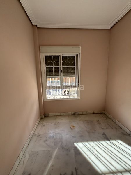 Foto 1806b3ae-a80a-4c9d-8a04-75993451728d. Casa aparellada amb xemeneia aparcament a Almensilla