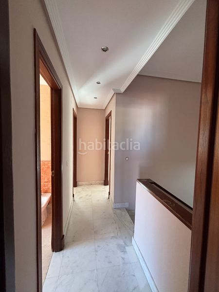 Foto b43562ec-60a1-403d-91f1-5b3c6f78015c. Casa aparellada amb xemeneia aparcament a Almensilla