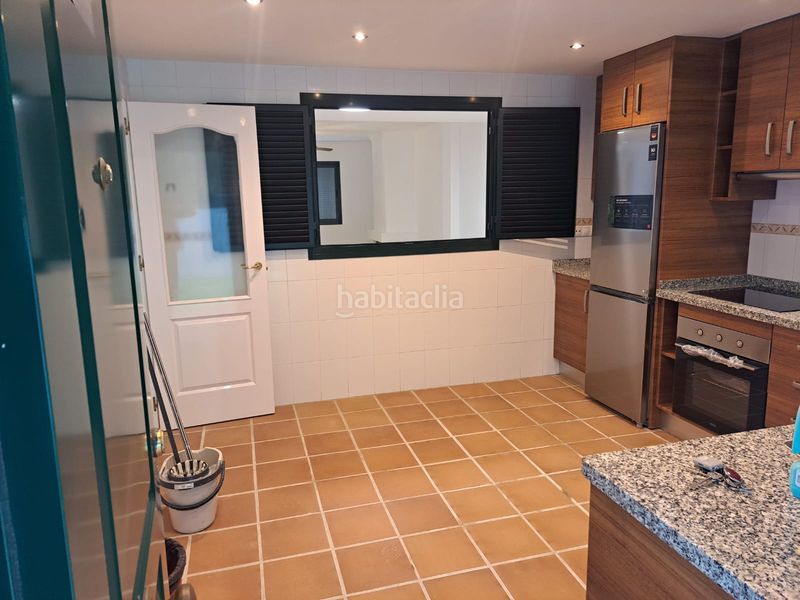 Foto 90361328-4491-4f5d-9696-64e63c8bd1e7. Casa adossada amb xemeneia aparcament piscina a San Luis de Sabinillas Manilva