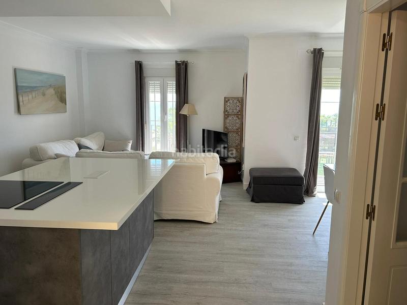 Foto cd4ba1a6-8ead-4b3a-89d0-524da14653a8. Attico con riscaldamento parcheggio piscina in Isla Canela Ayamonte
