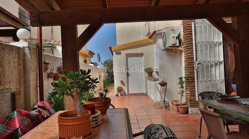 Foto 04367d57-3d61-4d7b-95c6-3d9097b76def. Casa aparellada amb aparcament piscina a Guadalmar Málaga