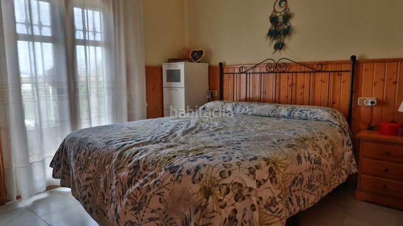 Foto 1dd4c57e-e884-4930-94d5-75d83c4089b3. Casa aparellada amb aparcament piscina a Guadalmar Málaga