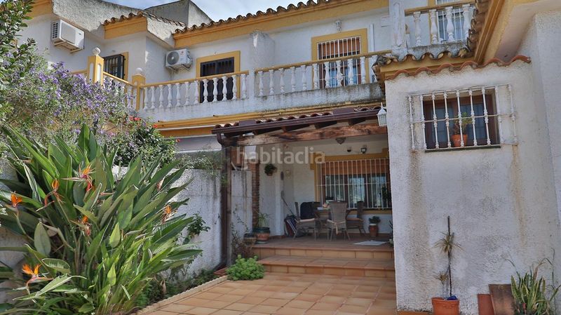 Foto 49a48c64-a78a-43ec-97b2-35a14a24e3f8. Casa aparellada amb aparcament piscina a Guadalmar Málaga