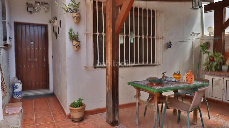 Foto 52068f1a-d07b-49fd-bff2-e0be6b77c188. Casa aparellada amb aparcament piscina a Guadalmar Málaga