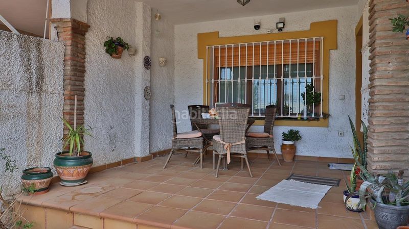 Foto 6d05fcc8-6fc7-45b5-ae28-f972f092df98. Casa aparellada amb aparcament piscina a Guadalmar Málaga