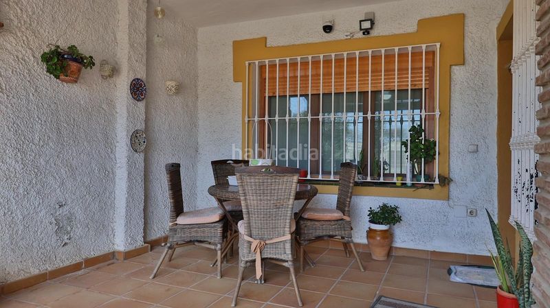 Foto 88f12bc5-ae7e-4439-b4e4-c8e6d1955cca. Casa aparellada amb aparcament piscina a Guadalmar Málaga
