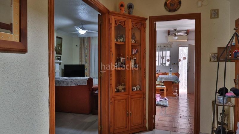 Foto 9af4b9b3-463d-4b42-9b75-dfce962d0844. Casa aparellada amb aparcament piscina a Guadalmar Málaga