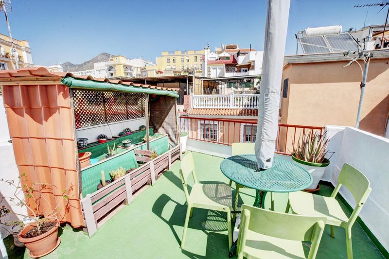 Foto c949df09-0820-4090-a326-95a64a59e5e0. Casa adosada casa en el centro de Arroyo de la Miel en Benalmádena