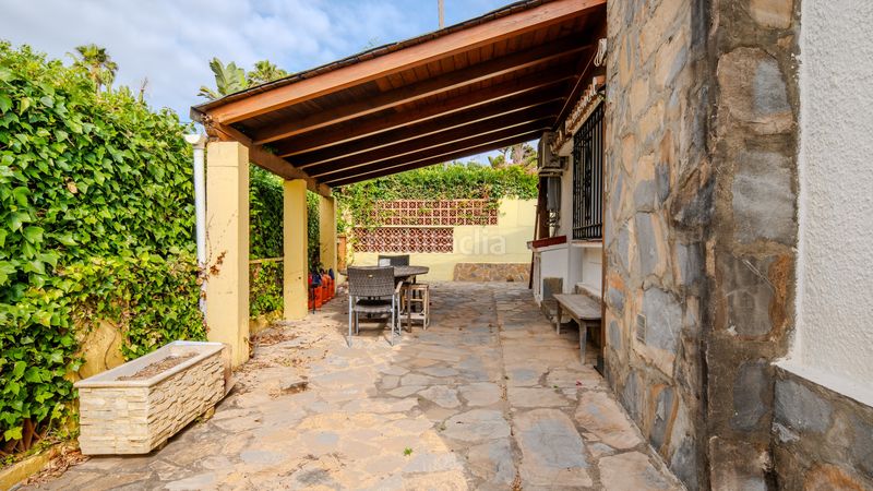Foto 0b82a410-1371-4357-990d-1f41ddd80474. Casa amb aparcament a Alcorrín Manilva