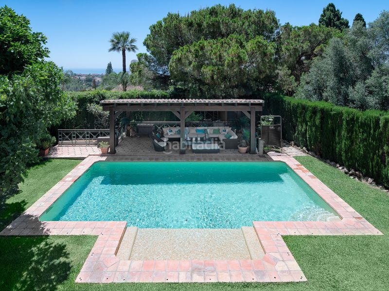 Foto 70bd6f1c-d0a0-45e1-9412-f626ece66f41. Casa amb aparcament piscina a Sierra Blanca Marbella