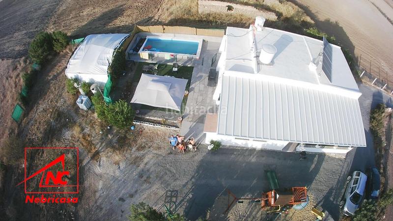 Foto db127365-759e-44bf-a7dc-02f75b5a6a6c. Masia amb piscina a Lebrija