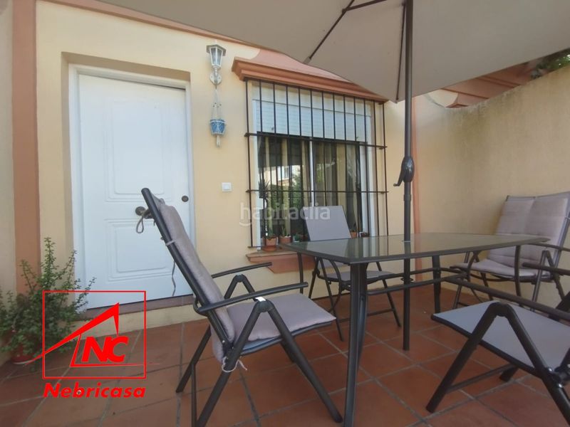 Foto 0f4f7028-4ea1-445d-b53e-0afea381511d. Casa aparellada amb aparcament piscina a Costa Ballena - Largo norte Rota