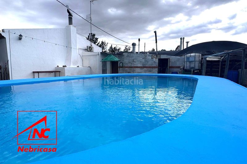 Foto c423b615-93a3-4b51-bec7-354f7c8e0d25. Masia amb aparcament piscina a Lebrija