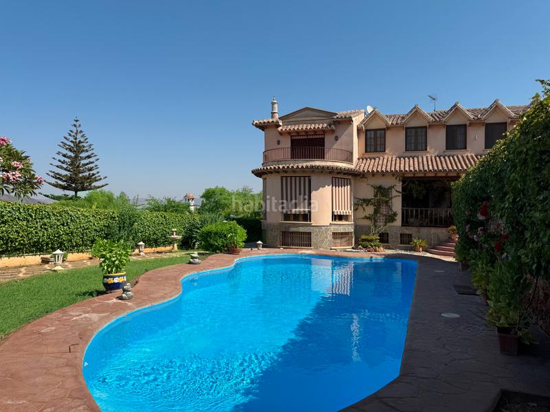Foto 3c5ba4f3-0014-4a6a-a0bb-470d6a4de2dc. Xalet amb xemeneia calefacció aparcament piscina a Alhaurín de la Torre