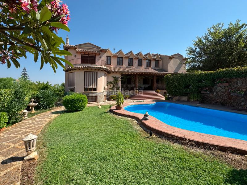 Foto d4467394-707b-47ba-be36-37f6bba2ff0e. Xalet amb xemeneia calefacció aparcament piscina a Alhaurín de la Torre