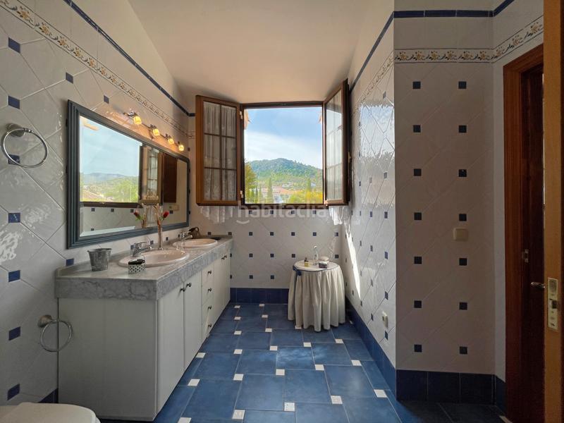 Foto f81ad0ba-c99b-482d-bb14-ef659223ef7c. Xalet amb xemeneia calefacció aparcament piscina a Alhaurín de la Torre