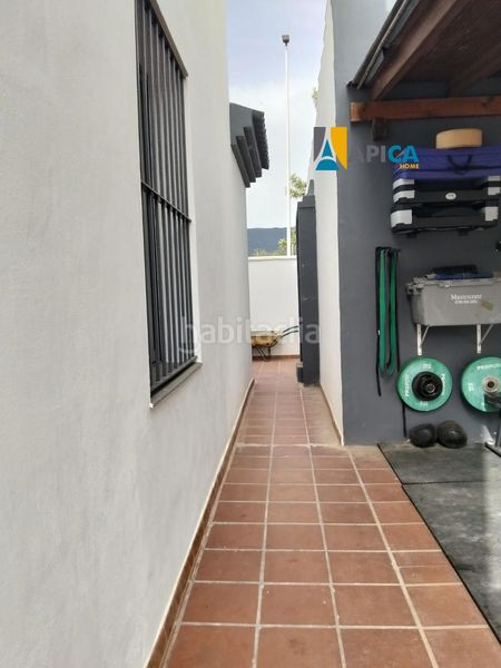 Foto 012a9612-cf37-45c9-91a9-3beb3c2e8d46. Casa adossada amb aparcament piscina a La Granja - La Colina - Los Pastores Algeciras