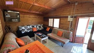 Masía en Sucina. Casa de madera en el palmar