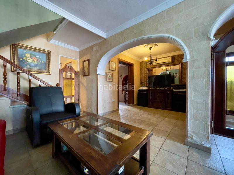 Foto 64aee9eb-ccde-4423-91bb-9cbf3f17c418. Casa a schiera con parcheggio piscina in San Andrés Golf Chiclana de la Frontera