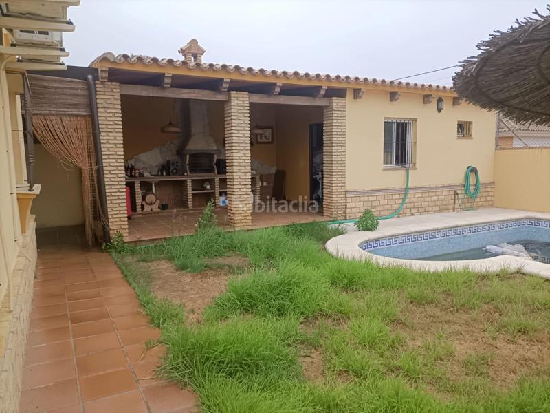 Foto 521657d9-e270-4c36-ac59-07fa01a70129. Chalet avec piscine dans Los Gallos Chiclana de la Frontera
