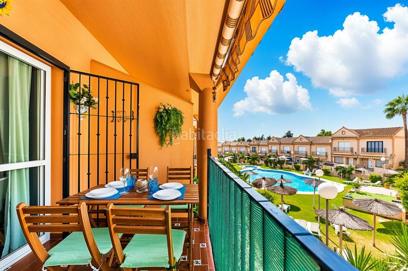 Foto 784dffd1-3d3f-45d2-9110-1f254023212a. Apartament amb aparcament piscina a La Barrosa Chiclana de la Frontera