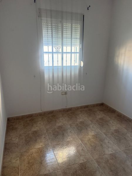 Foto 5e0b7c94-2770-4996-83d6-e1a4f47c6d7c. Casa adossada amb calefacció a Núcleo urbano Chiclana de la Frontera