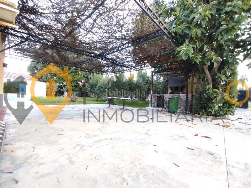 Foto 034b261a-2276-49cd-97ce-cc8afeaf00d3. Chalet con camino parcheggio piscina in Carmona