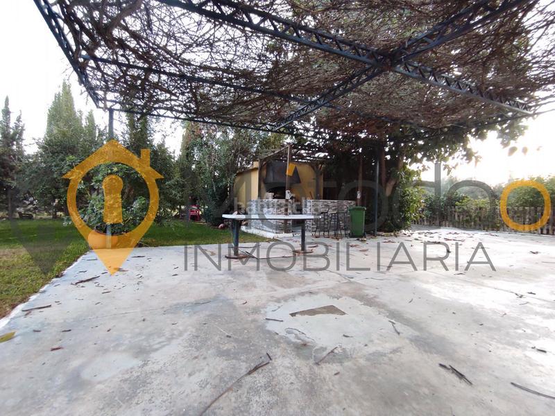 Foto d59df342-85ac-4c63-8dd0-25f7f2df6e91. Chalet con camino parcheggio piscina in Carmona