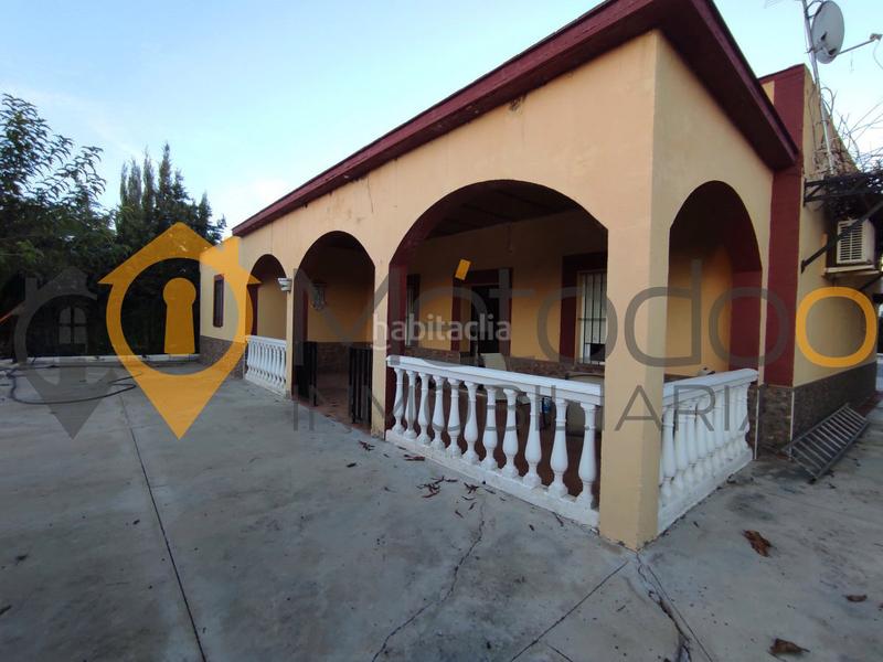 Foto d7d46bfb-e135-4eae-b9b4-5be39b9b497c. Chalet con camino parcheggio piscina in Carmona