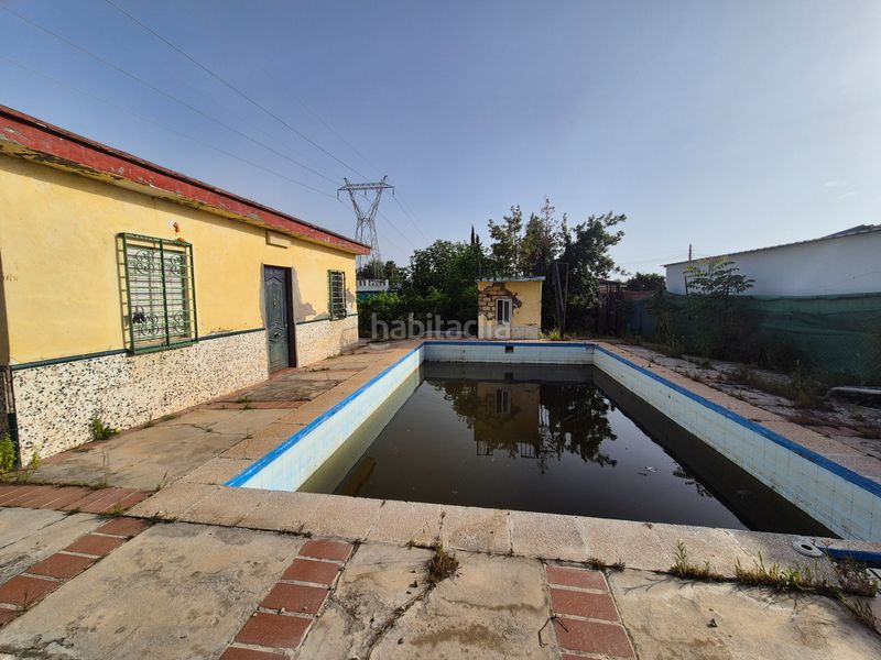 Foto ed7fb755-ef8f-4302-8637-7c91ff123d44. Xalet amb xemeneia aparcament piscina a Oromana Alcalá de Guadaira