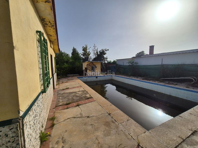 Foto fa2a0527-9213-4419-a107-3662fe7efc48. Xalet amb xemeneia aparcament piscina a Oromana Alcalá de Guadaira