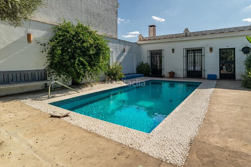 Foto 3fc2100e-8199-4be1-ad80-d58688433b52. Casa amb piscina a Valencina de la Concepción