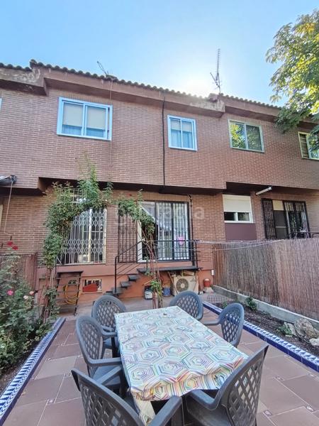 Foto 94fa5e27-1b44-4279-b313-c68025de73d4. Casa a schiera con camino riscaldamento in La Poveda Arganda del Rey