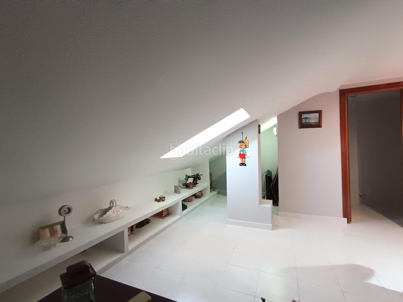 Foto 0333ef67-e944-44de-a2de-3320bf034c0d. Casa adossada amb xemeneia calefacció a La Poveda Arganda del Rey