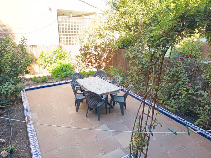 Foto ab8e70a7-bf32-410d-9fc1-404565ca3184. Casa adossada amb xemeneia calefacció a La Poveda Arganda del Rey