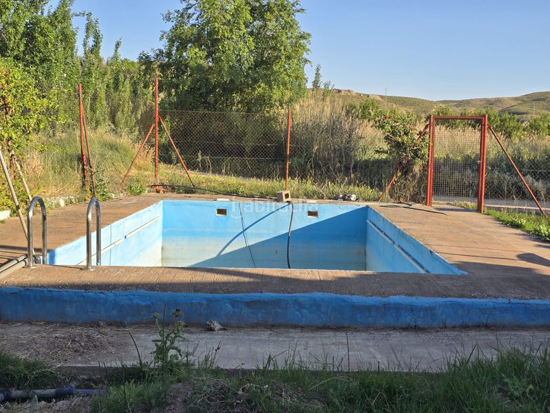 Foto d296a9fb-323a-45b8-ab5e-bdfb31fe06ca. Casa amb xemeneia calefacció piscina a Chinchón