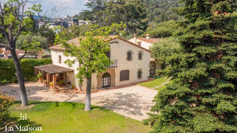 Foto 896aea3d-edc9-4a47-8516-09089e1d20f1. Masia amb xemeneia calefacció piscina a Centre Sant Andreu de Llavaneres