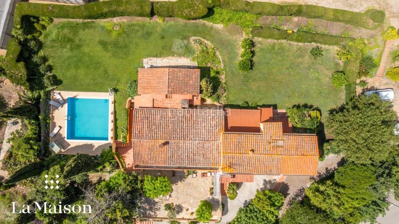 Foto 39fcb273-55d0-4346-9a55-b2a12e9400cc. Chalet with fireplace heating pool in Arenys de Munt