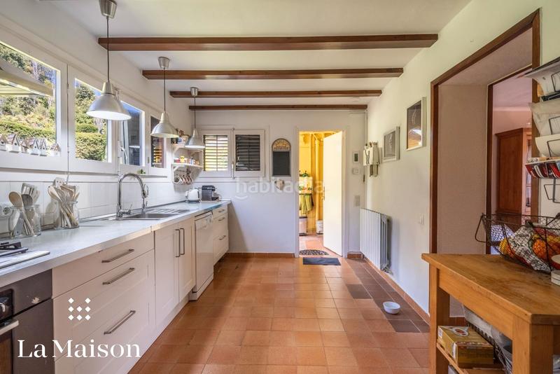 Foto ad80c310-ffa3-4e20-ad9e-abe2664004ef. Chalet with fireplace heating pool in Arenys de Munt