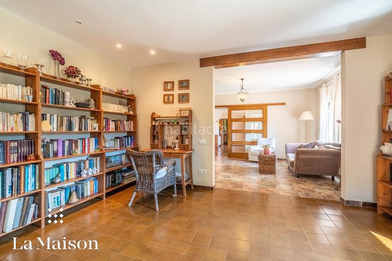 Foto f232f6c8-8999-4d20-9336-222588ae422a. Chalet with fireplace heating pool in Arenys de Munt