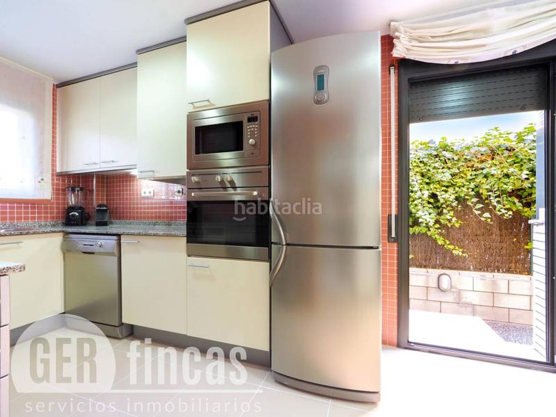 Foto 1317be4e-e59d-4d1e-9e9e-c4408722bd54. Casa con piscina propia, patio, terraza, y garaje en Terrassa