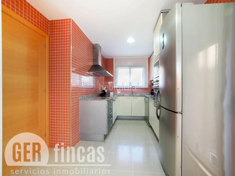 Foto 82008ade-07e0-480a-acc3-1fdf34152bc5. Casa con piscina propia, patio, terraza, y garaje en Terrassa