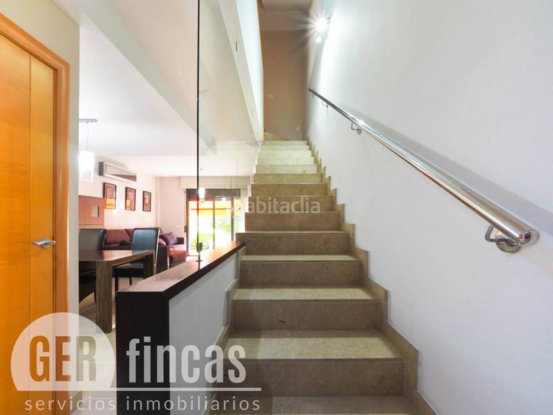 Foto d94b69c5-3086-473a-a697-e1165c523807. Casa con piscina propia, patio, terraza, y garaje en Terrassa